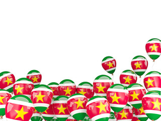 Flying balloons with flag of suriname