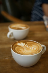 coffee latte art in cofeee sbop vintage color tone