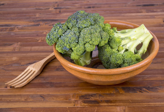 broccoli in a bowl with a fork
