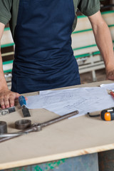 Carpenter in his desk