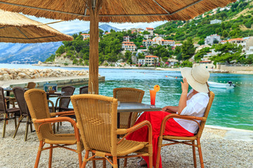 Attractive young woman relaxing on a tropical beach