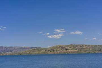 Fototapeta na wymiar Blue Mesa Reservoir, and the town of Sapinero in center of photograph. In this view the reservoir is 100% capacity.