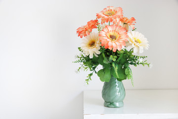 Flower bouquet on white table.