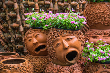 Gardens decorated with clay pots.