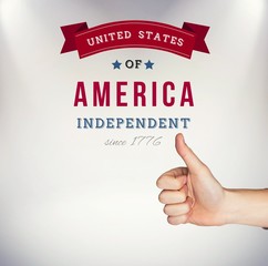 Composite image of hand showing thumbs up