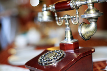 Retro telephone with wooden case and buttons