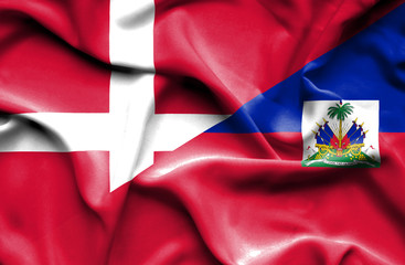 Waving flag of Haiti and Denmark