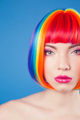 Fototapeta premium beautiful woman wearing colorful wig