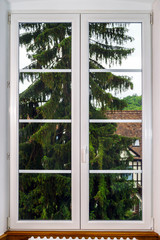 Big pvc window with decoration elements in old french house