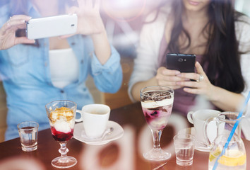 Two beautiful woman in cafe