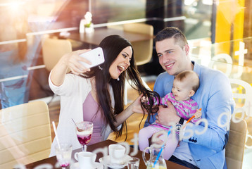 Young parents with their daughter