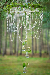 Wedding decor with wheel, glass beads and roses in bulbs