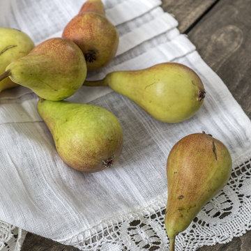 Pears on Dark Wooden Table