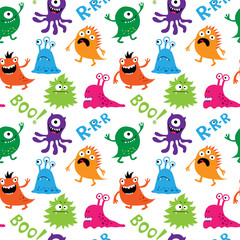 Seamless pattern with cute monsters and inscriptions