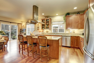 perfect kitchen with hardwood floor and island.
