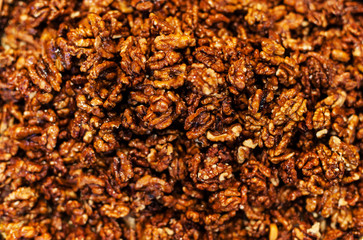Walnut kernels  background on a market stall close-up. Food heal