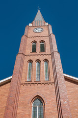 Fototapeta na wymiar Clock tower of the Dutch Reformed Church in Boshof