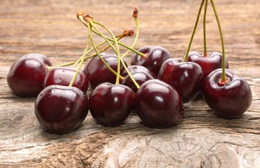 cherries on wooden table