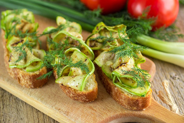 Bruschetta with grilled zucchini.  Soft focus