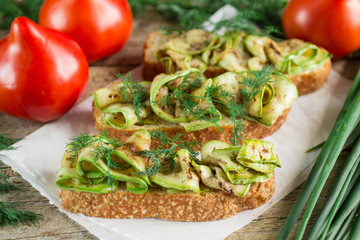 Bruschetta with grilled zucchini.  Soft focus