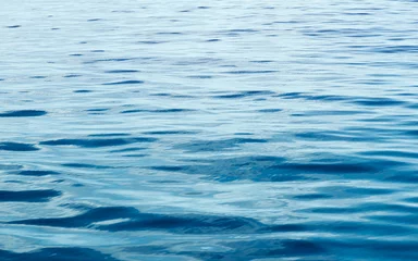 Abwaschbare Fototapete Ozeanblaues Wellenwasser © Alex