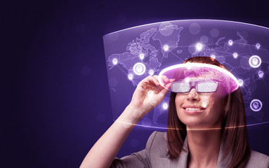 Young woman looking at futuristic social network map