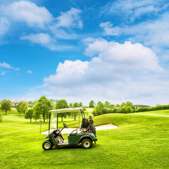 Golf course lanscape with green field over blue sky