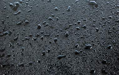 rain drops on a black background