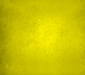 elegant yellow background, bright colored shiny golden center with vintage grunge texture design border