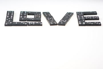Word love made of wooden dominoes