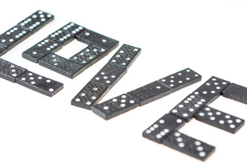 Obraz premium Word love made of wooden dominoes
