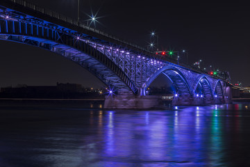Fototapeta na wymiar Peace Bridge Over Niagara River with Reflection