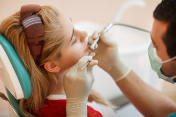 Woman patient at dentist dental clinic teeth care