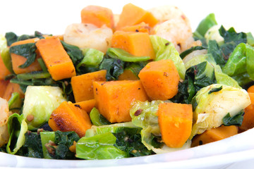 Sweet potato casserole with greens and shrimps