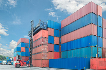 forklift handling container box loading to truck in import expor