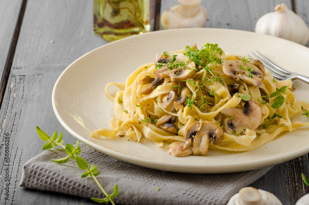 Poster fettuccine with garlic and mushrooms