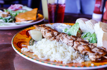 Chicken souvlaki with rice