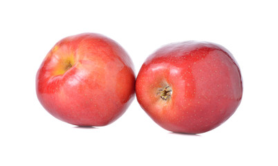 Fototapeta na wymiar red apples with stem on white background