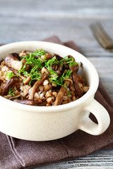  Buckwheat with fried mushrooms in a bowl