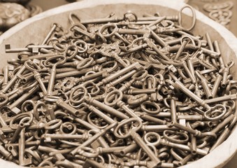 bunch of old brass and bronze keys for sale at flea market