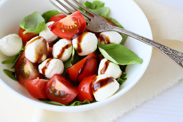 fresh caprese salad in bowl