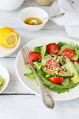 salad with avocado and tomatoes