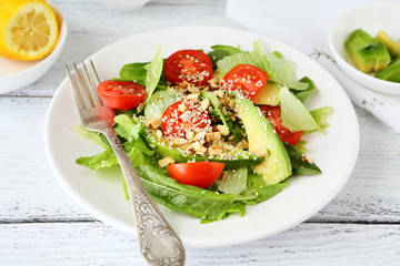 salad with slices of avocado and tomatoes