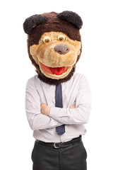 Businessman with a tie wearing a bear mask