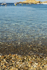 Beach shore with some boats in Costa Brava, Catalonia