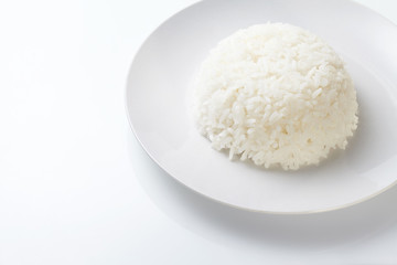 Rice on white plate isolated on white background