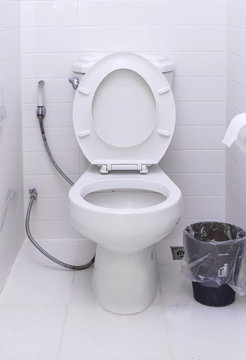 White toilet bowl in a modern bathroom