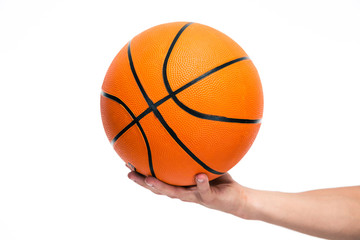 Closeup portrait of a male hand holding basket ball
