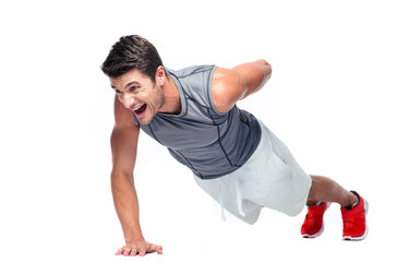 Fitness young man doing push ups