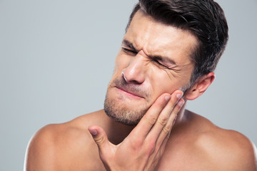Fototapeta premium Young man with a toothache